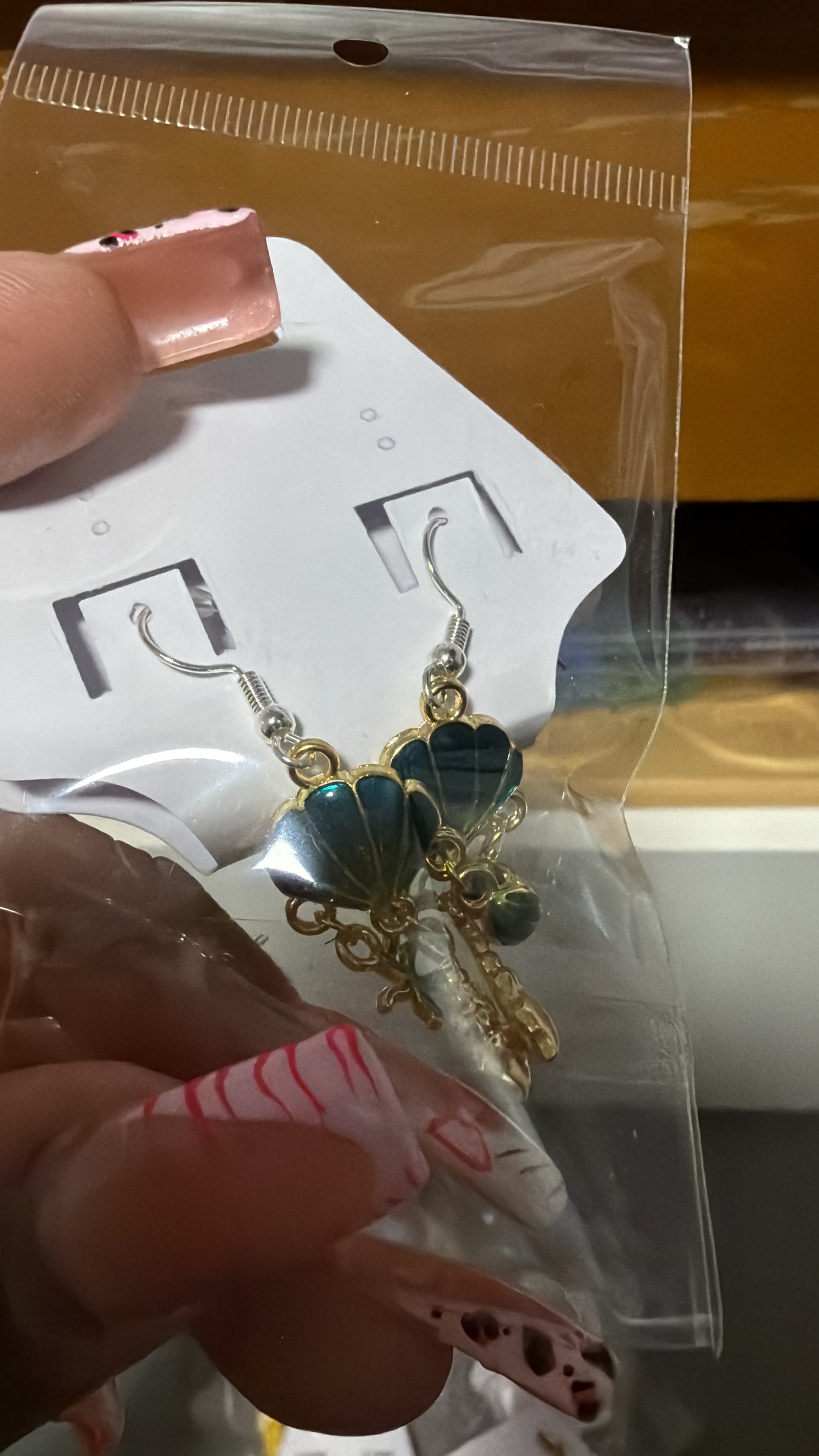 green seashell earring